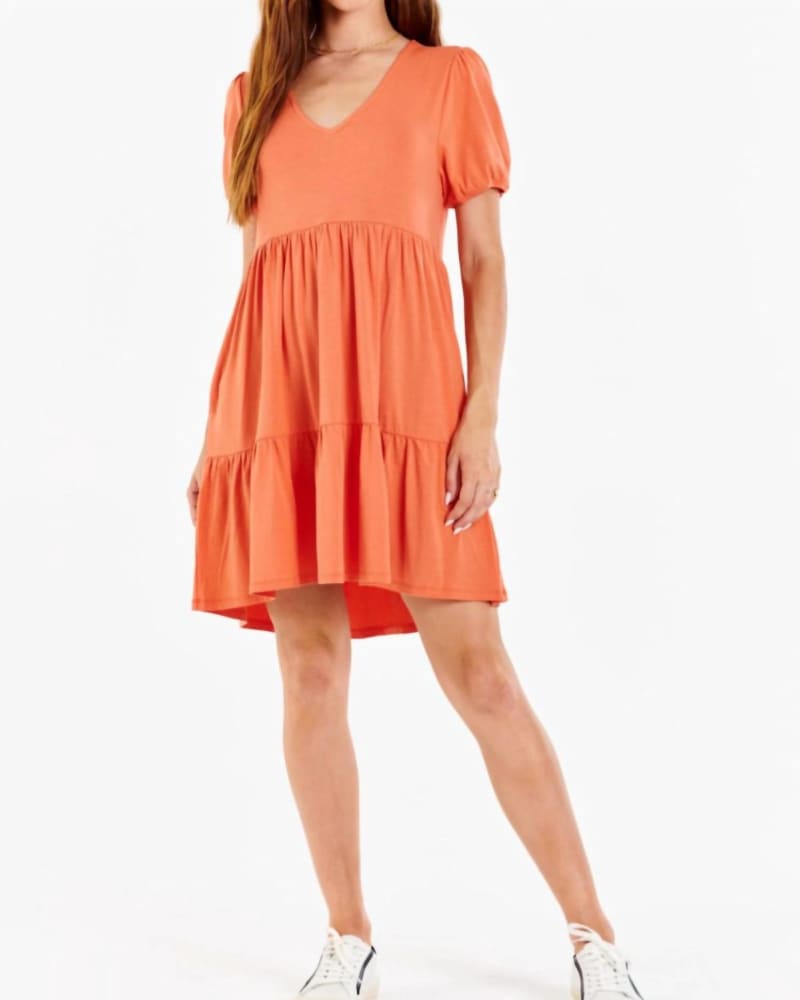 Front of a model wearing a size L Maude Puff Sleeve Dress In Canyon in Canyon by Another Love. | dia_product_style_image_id:359499